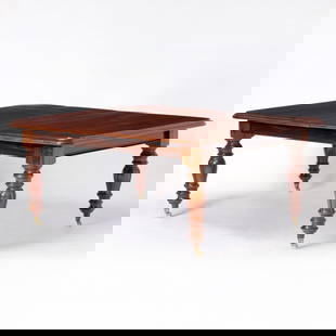William IV Mahogany Dining Table With two leaves: Second quarter 19th century The molded rectangular top with two leaves on tapering baluster turned legs, brass caps and casters. Height 30 inches, width 65 1/4 inches, length extended 116 3/4 inches.