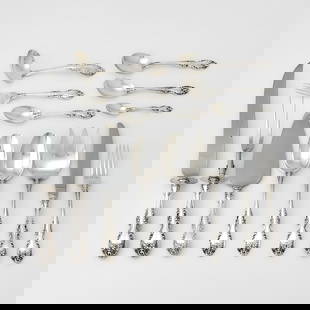 Gorham Sterling Silver 'Melrose' Pattern Flatware Service: 20th Century Comprising: Twelve dinner forksThirteen salad forksTwelve dinner knivesTwelve round soup spoonsTwenty-two teaspoonsSixteen demitasse spoonsTwo serving spoonsServing forkGravy
