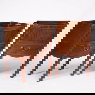 Pair of George III Style Mahogany Bedside Tables: Height 31 3/4 inches, width 20 1/4 inches, depth 17 7/8 inches.  With previous restorations, leather replaced, shrinkage cracks to tambour, old marks and scratches, chips and losses to edges.<
