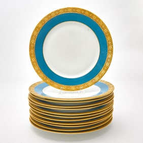 Twelve Austrian Porcelain Gilt and Blue Decorated Dinner Plates