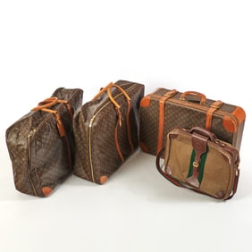 Group of Three Louis Vuitton Monogram Suitcases Together with a Gucci Monogram Coated Canvas