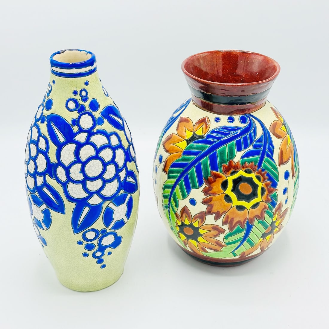 Two Charles Catteau for Boch Freres Art Deco Vases: Circa 1925 Height of taller green and blue vase 10 3/4 inches.