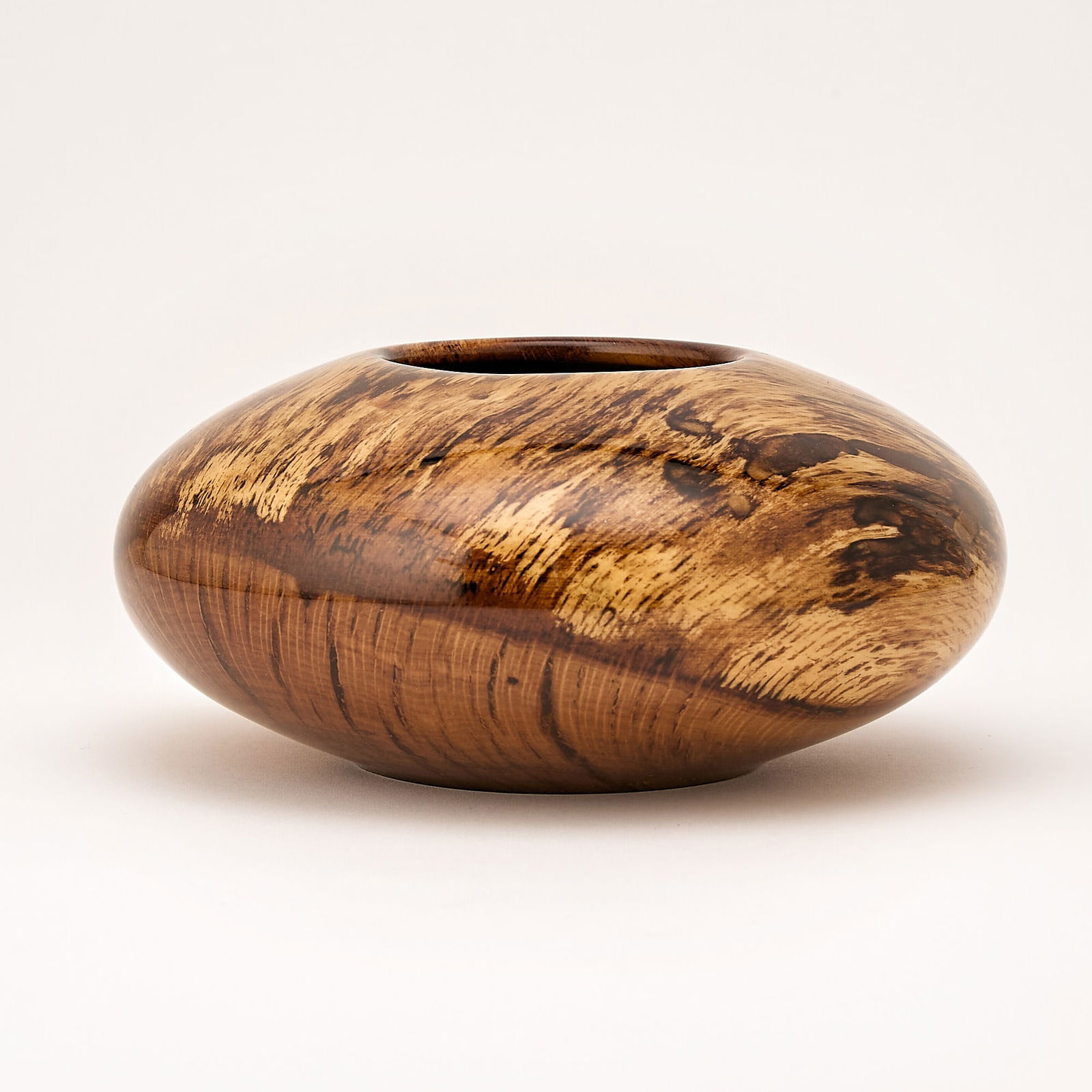 Matt Moulthrop Turned Live Oak Vessel: Late 20th/early 21st century Height 3 3/4 inches, diameter 7 3/4 inches.