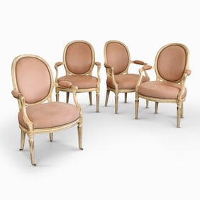 Set of Four Louis XVI Painted and Parcel Gilt Fauteuils