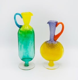 Two Kosta Boda Glass Pitchers