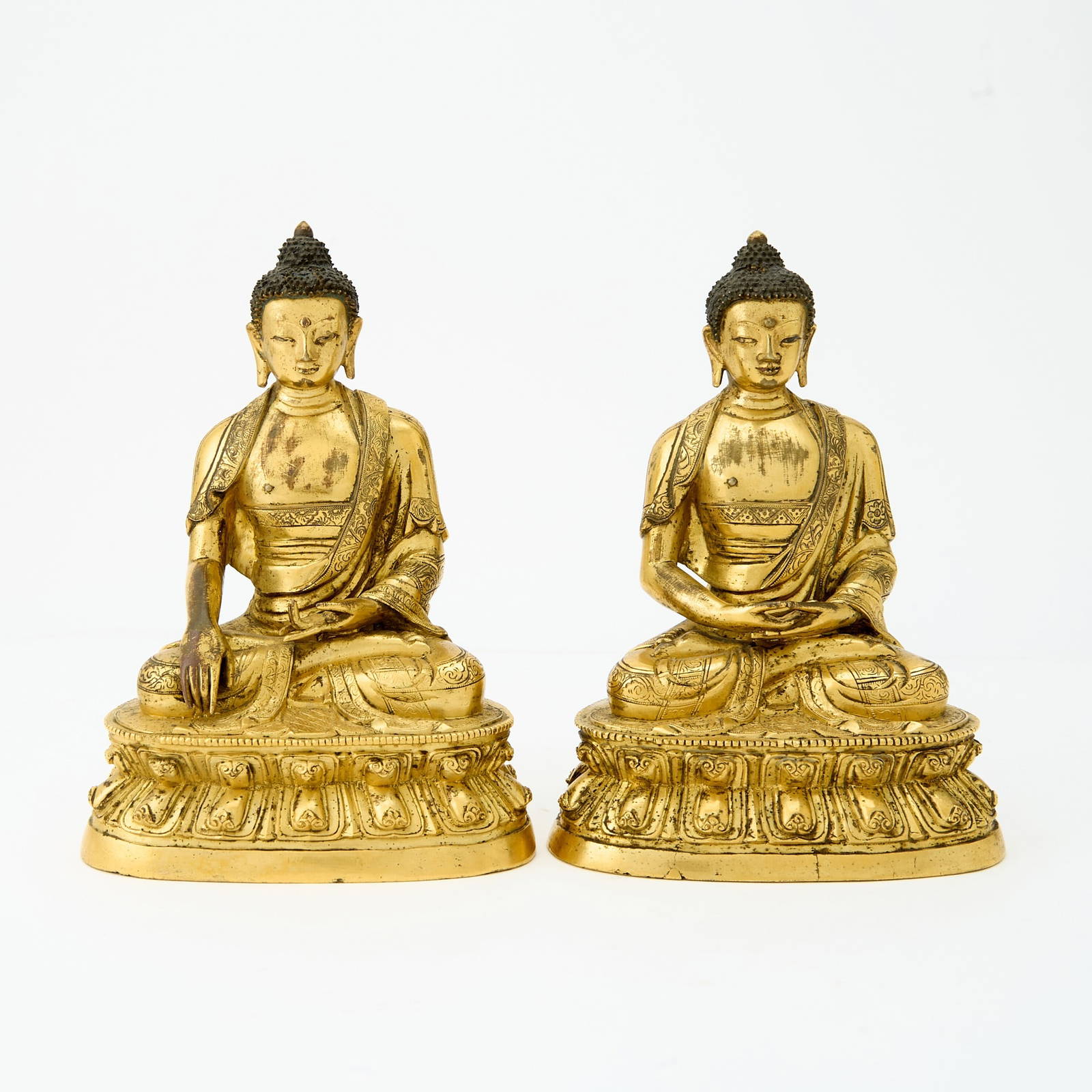 Two Chinese Finely Gilded Cast Bronze Figures of Buddha Qianlong Period
