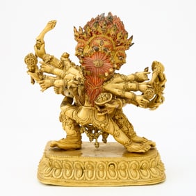 A Tibetan Gilt Bronze Figure of Mahakala with Consort