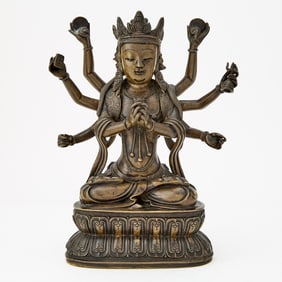 A Chinese Cast Bronze Figure of Doumu