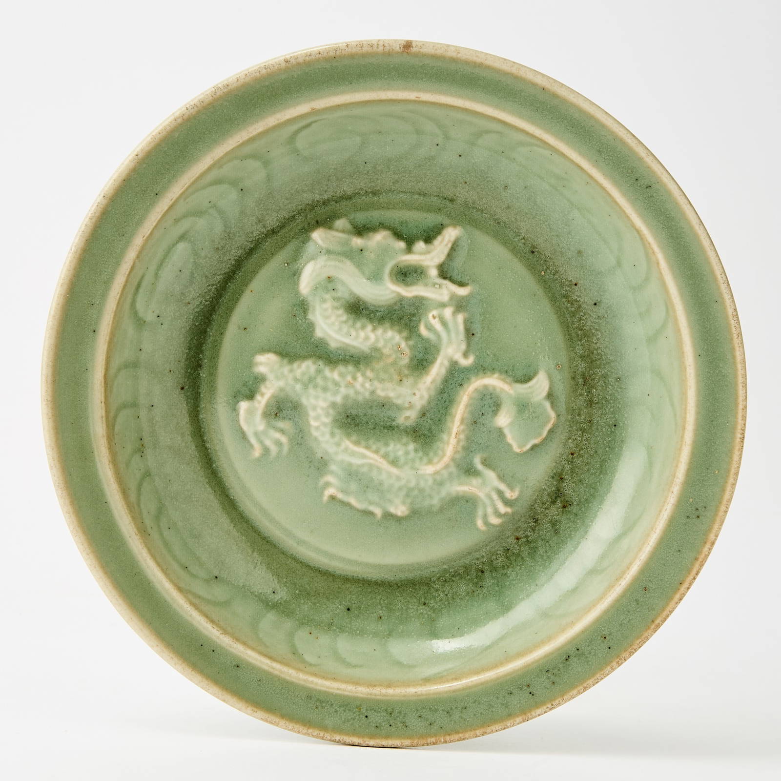A Chinese Longquan Celadon 'Dragon' Dish Yuan Dynasty or Later
