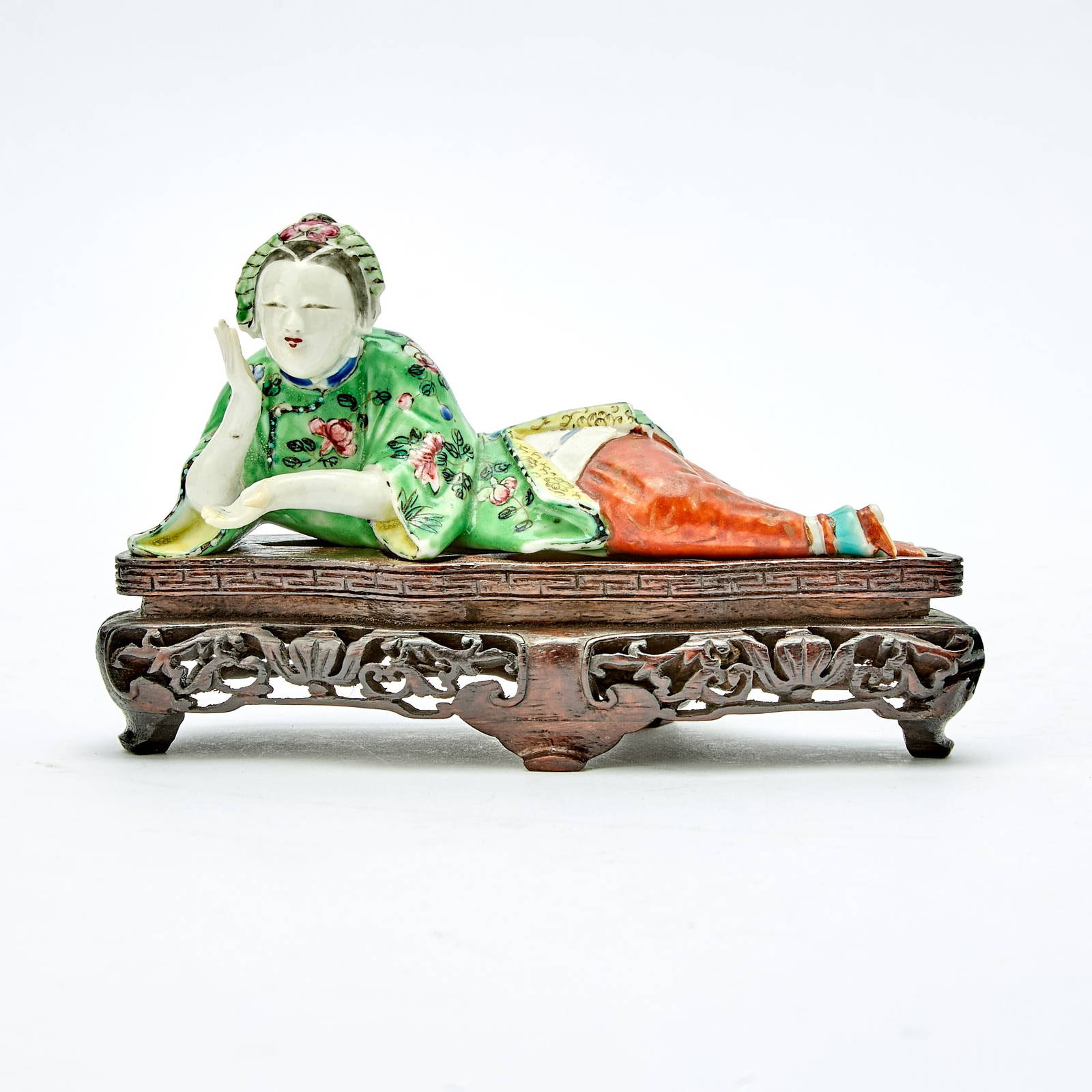 A Chinese Enameled Porcelain Figure of a Reclining Lady 18th Century