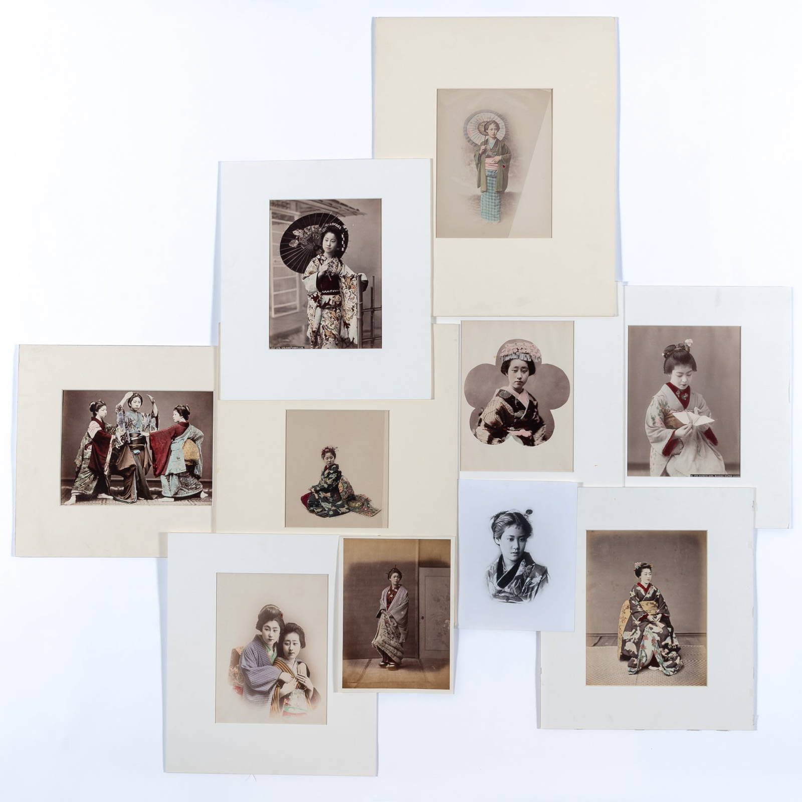 A Group of Japanese Hand-tinted Photographs Depicting Subjects of Beauty