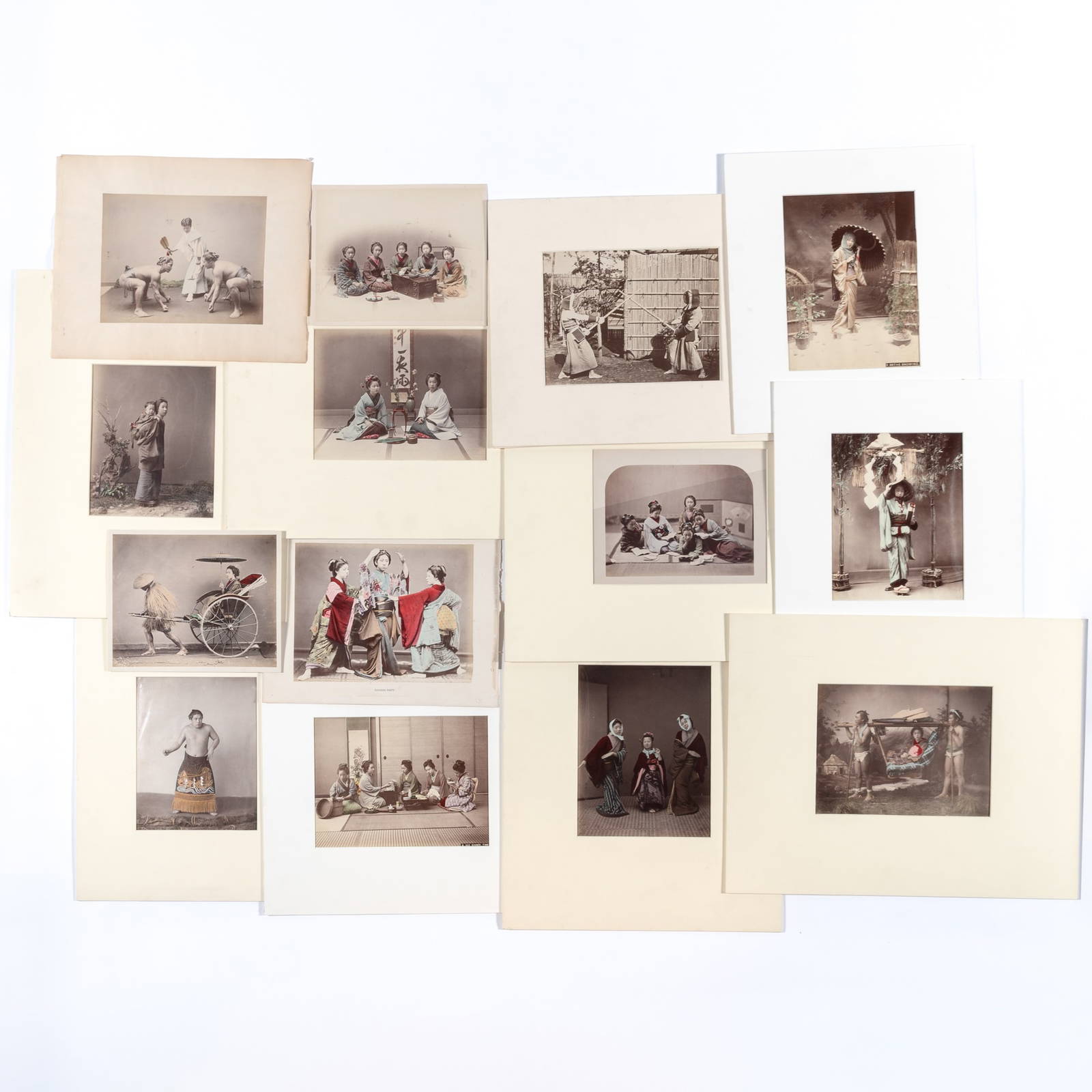 A Group of Japanese Studio Albumen Photographs Showing Figural Subjects Meiji Period
