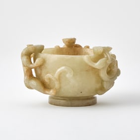 A Chinese Carved Celadon and Russet Jade Cup Ming Dynasty