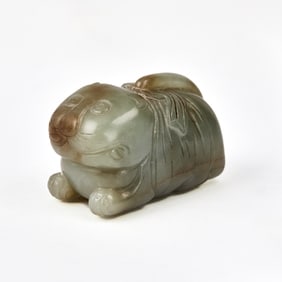 A Chinese Carved Celdon Jade Carving of a Cat Ming Dynasty
