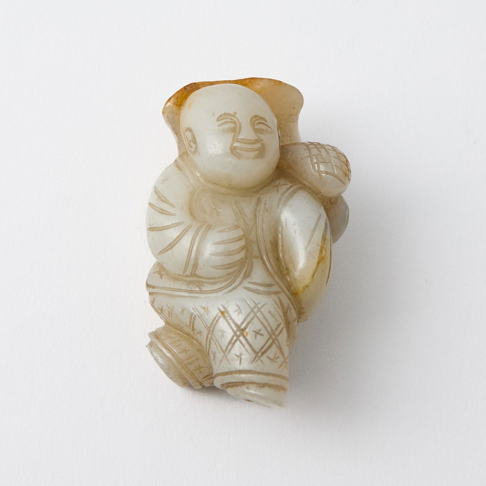 A Chinese White Jade Figural Carving of a Boy Qing Dynasty or Earlier (1 of 2)