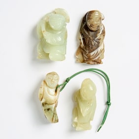 Four Chinese Carved Jade Pendants of Boys 19th Century