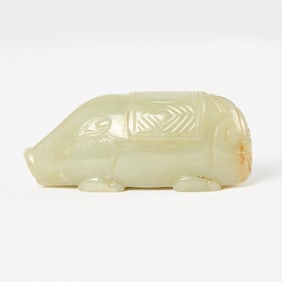 A Chinese Celadon Jade Carving of a Pig Qing Dynasty