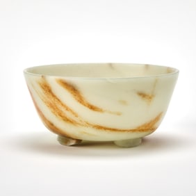 A Chinese Russet and Pale Celadon Jade Footed Bowl Qianlong Period