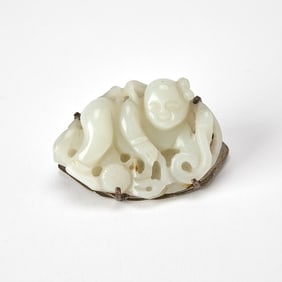 A Chinese White Jade Carving of a Boy Ming-Qing Dynasty