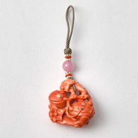 A Chinese Red Coral Toggle of a Squirrel 20th Century