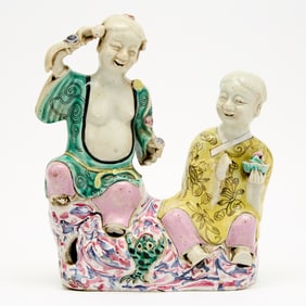 A Chinese Enameled Porcelain Figure of Hehe Erxian 18th Century