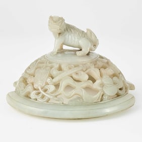 A Chinese Carved White Jade Cover