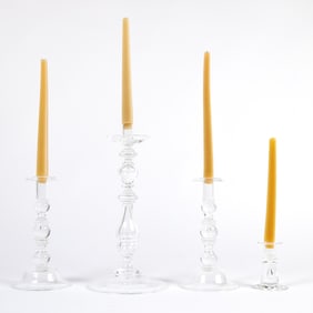 Group of Four Steuben Glass Candlesticks