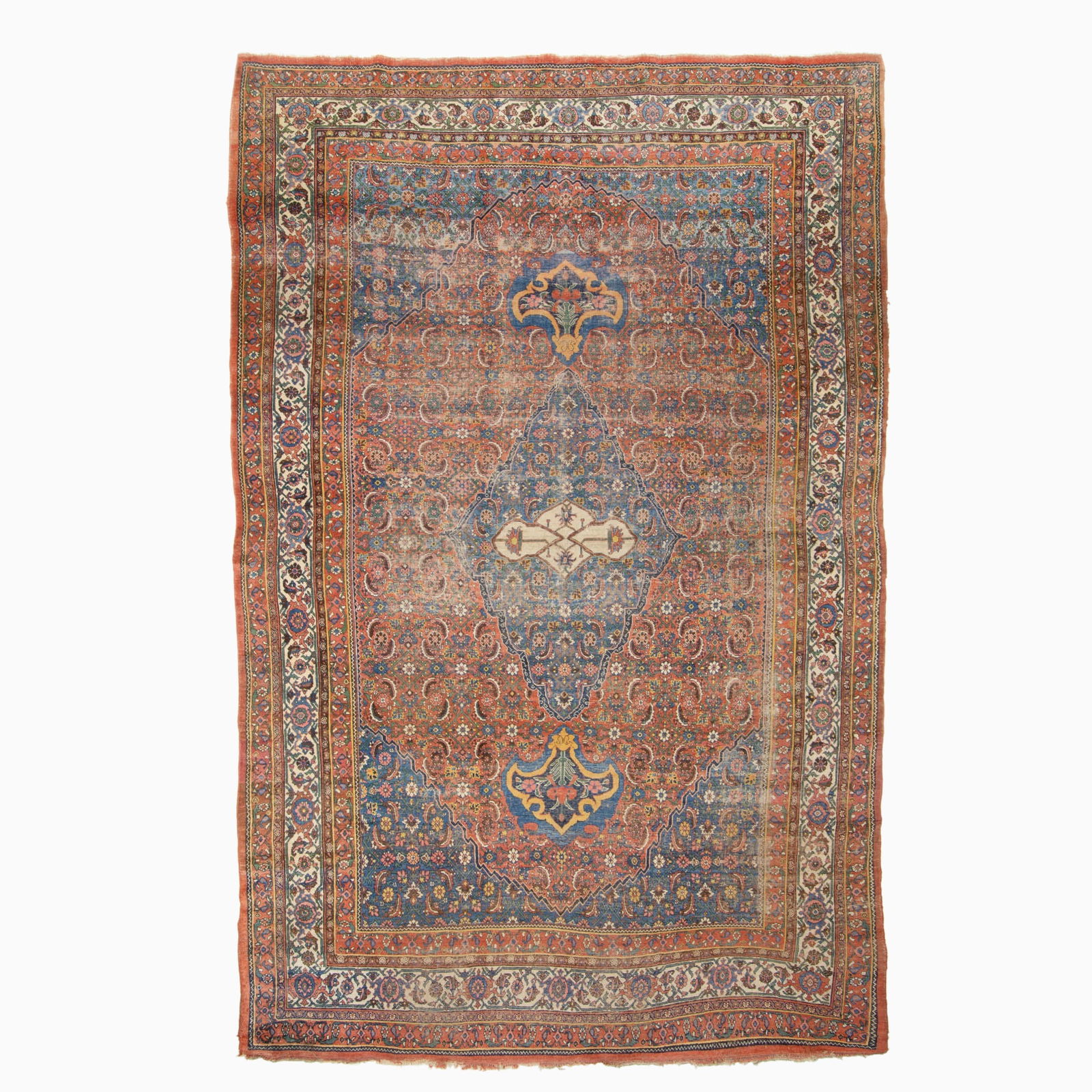 Bidjar Carpet: North Persia, Late 19th century The central pendant medallion on the madder field flanked by complementary spandrels is within an ivory palmette and vine border. Wool foundation. (14' 0" x 9' 0") Over