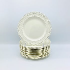 Set of Fourteen English Creamware Basketweave Dinner Plates