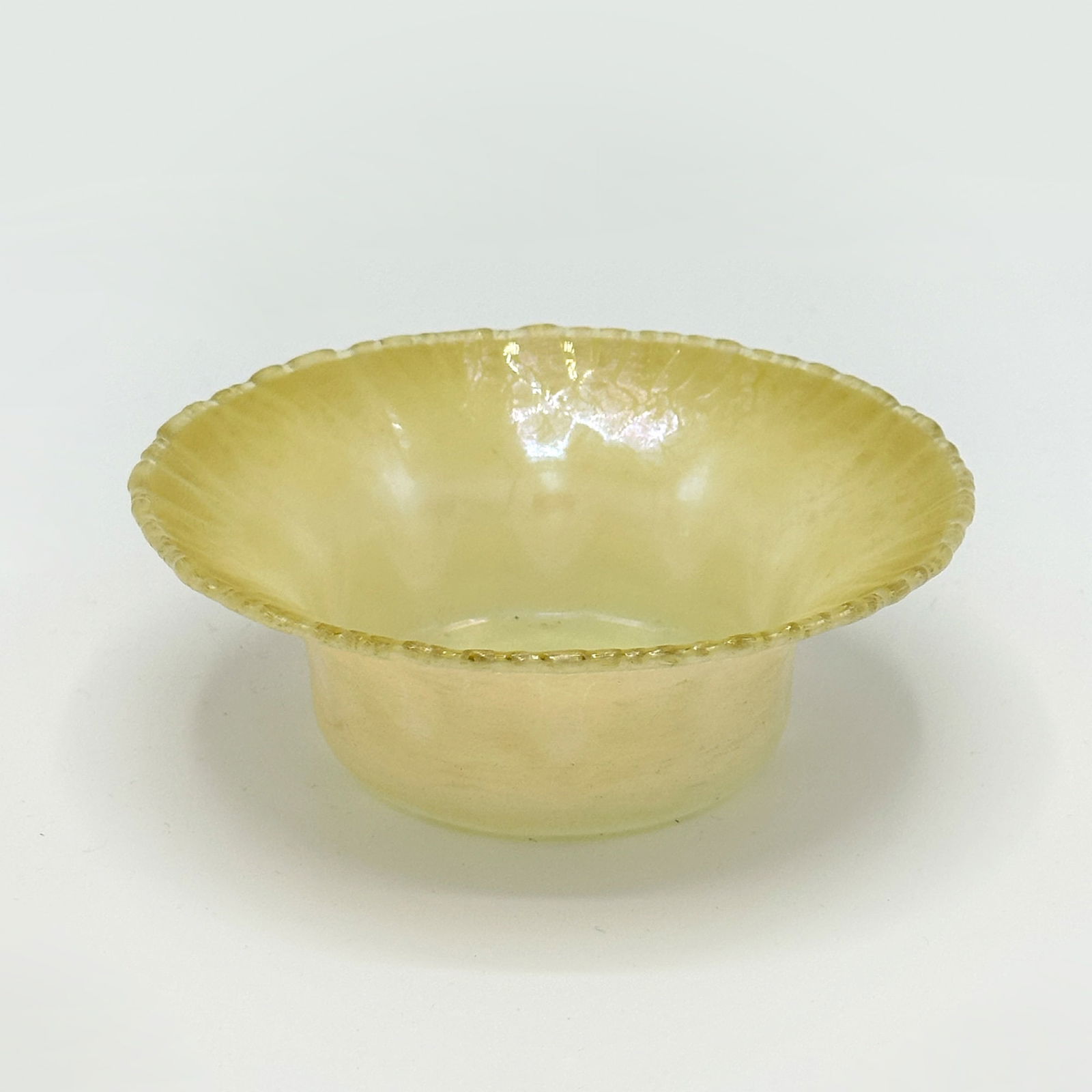 Tiffany Yellow Pastel Favrile Glass Dish: 1920-28Signed FavrileDiameter 5 inches. Please note: This lot will be on view in Boston.