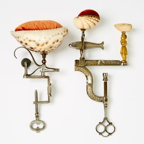 Two Steel Sewing Clamps Incorporating Seashells