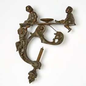 German Cast Iron Sewing Clamp Depicting Children on a Seesaw