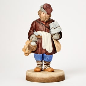 Russian Porcelain Figure of a Sbiten and Bagel Vendor