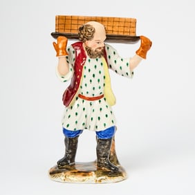 Russian Porcelain Figure of Vendor Carrying a Tray