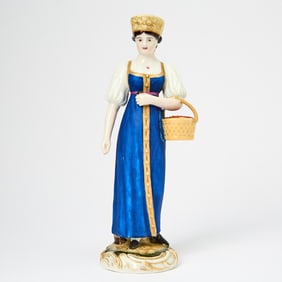 Russian Porcelain Figure of a Woman with a Basket of Berries