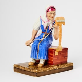 Russian Porcelain Figure of a Woman Spinning