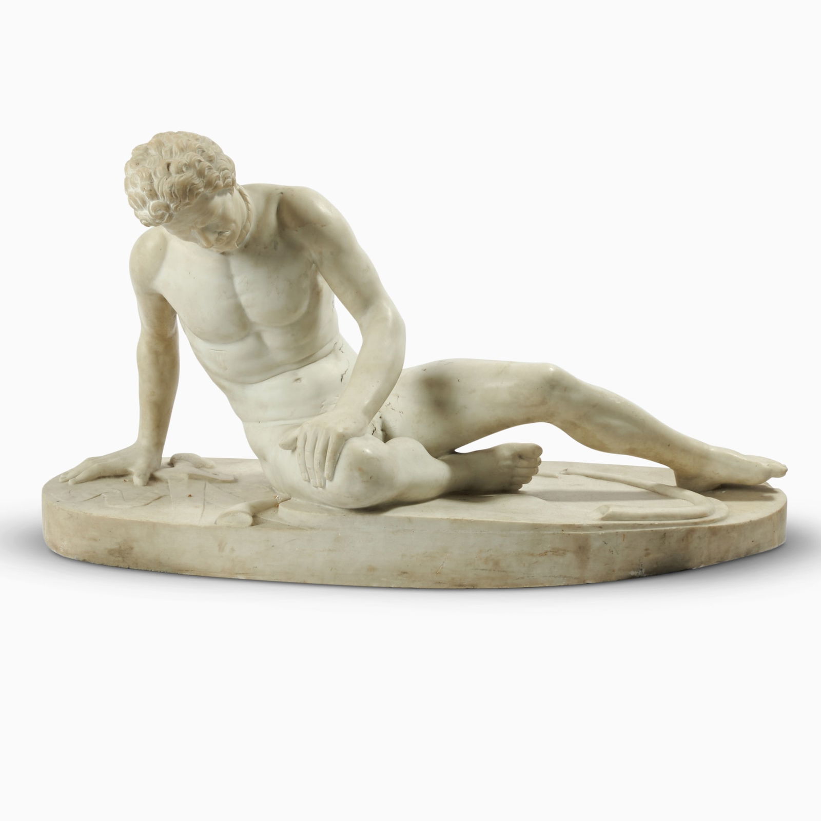 Large Italian Grand Tour Carved Marble Sculpture of the Dying Gaul: After the antique, 19th century The nude warrior collapsed on his left side, his right arm supports the upper body, while his head bows downward in an expression of exhaustion and suffering. Height 20