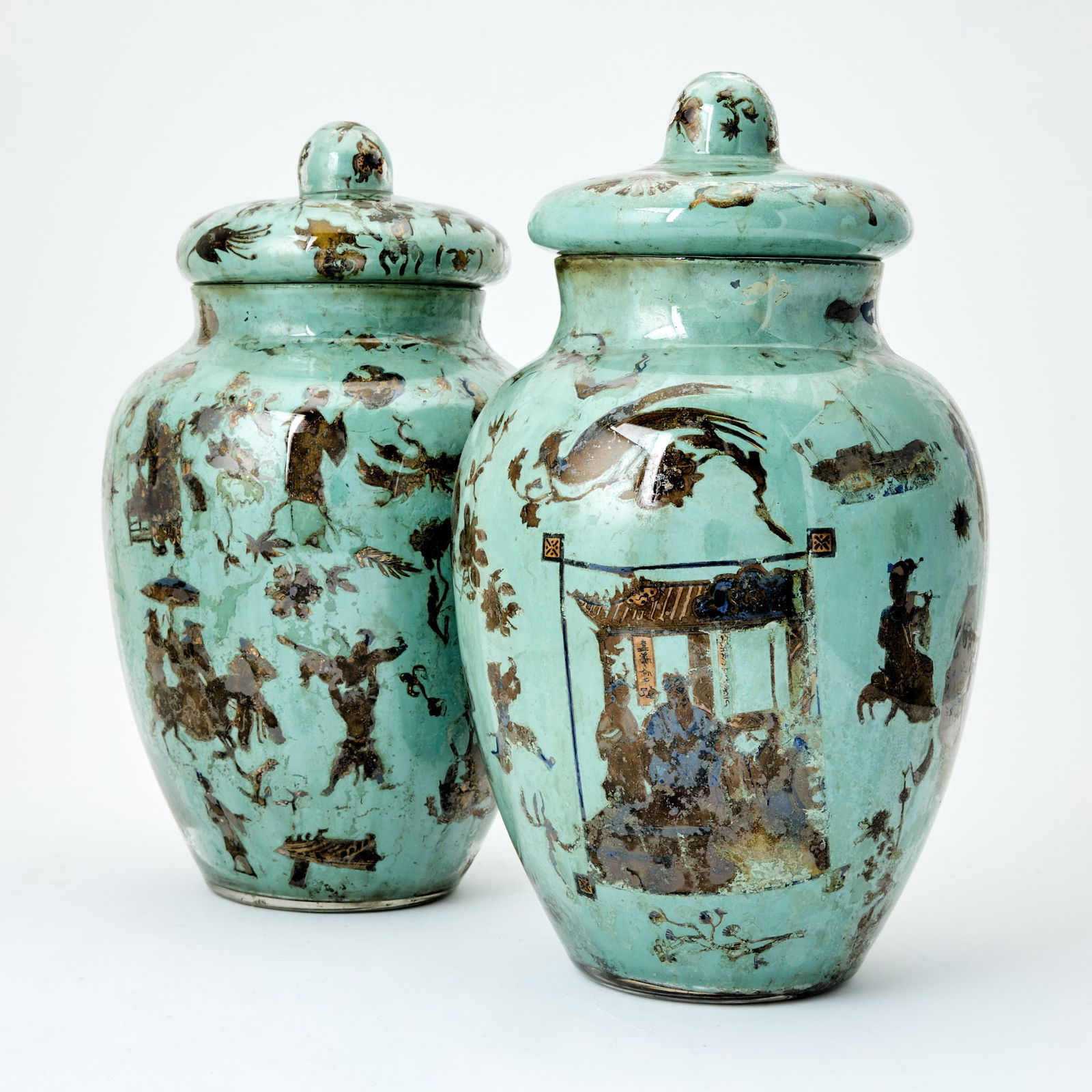 Pair of English Glass Celadon-Ground Declacomania Vases and Covers: Mid 19th century Each of baluster form decorated in the chinoiserie taste. Height 15 1/2 inches (39.4 cm), width 9 inches (23 cm). Provenance: Ariane Dandois, Paris, April 2000. Decalcomania referred