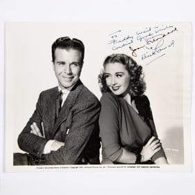 A signed photograph of Joan Blondell and Dick Powell
