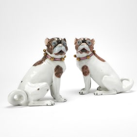 Pair of Dresden Gilt and Hand-Painted Porcelain Figures of Pug Dogs
