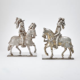 Pair of Silvered Metal Figural Bookends