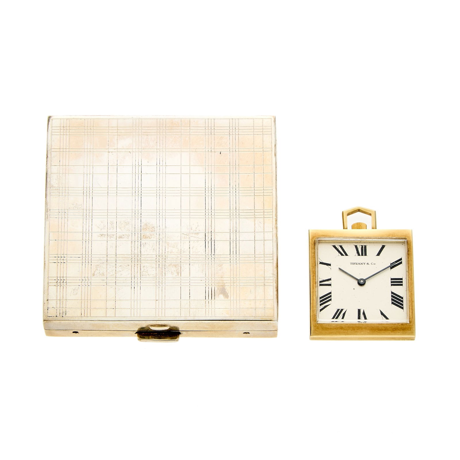 Tiffany & Co. Gold Travel Clock and Silver Compact: 14 kt., mechanical, square white dial with black Roman numerals, dial signed Tiffany & Co., case and movement signed Concord Watch Co., case no. 147283, silver compact signed Tiffany & Co., go