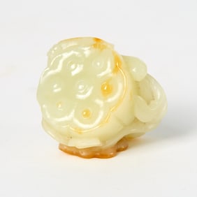 A Chinese White Jade Carving of a Lotus Pod Qing Dynasty