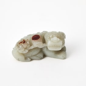 A Chinese White Jade Carving of Qilin and Cub