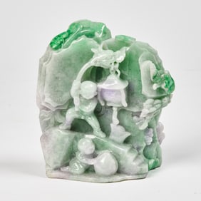 A Chinese Relief-Carved Jadeite Boulder with Boys Holding a Lantern and a Peach 20th Century