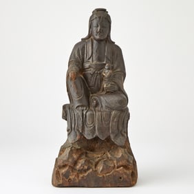 A Chinese Carved Wood Figure of Guanyin Ming Dynasty or Later