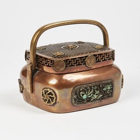 A Chinese Copper Rectangular Hand Warmer with Swing Handle Qing Dynasty