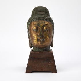 A Chinese Gilt Bronze Head of Guanyin
