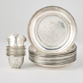 A Group of Nineteen Chinese Export Silver Saucer Dishes Incised with Butterflies and Gourds 19th