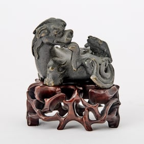 A Small Chinese Cast Bronze Figure of a Qilin Ming Dynasty or Earlier